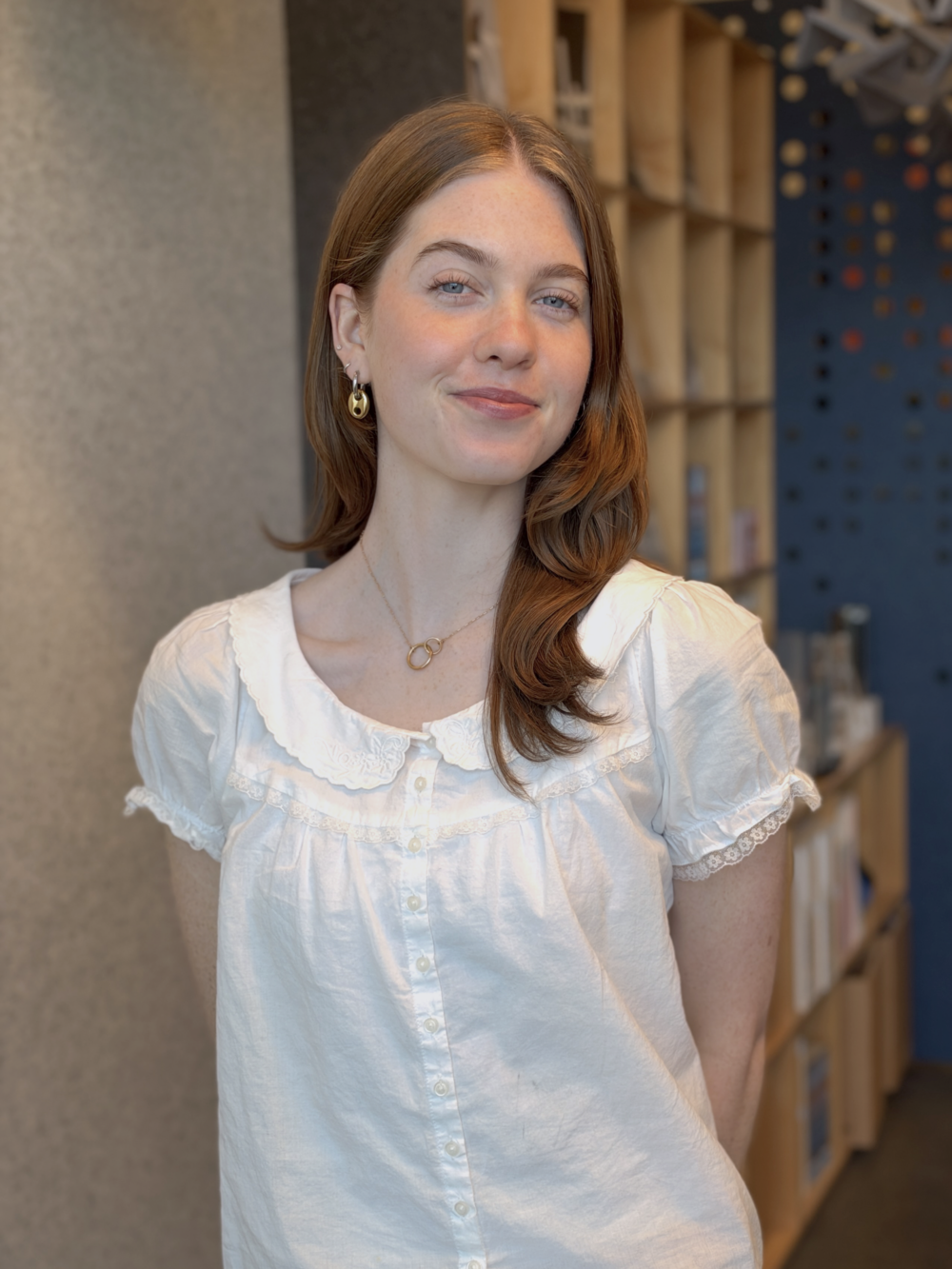 Portait photo of Helena Horton smiling in office